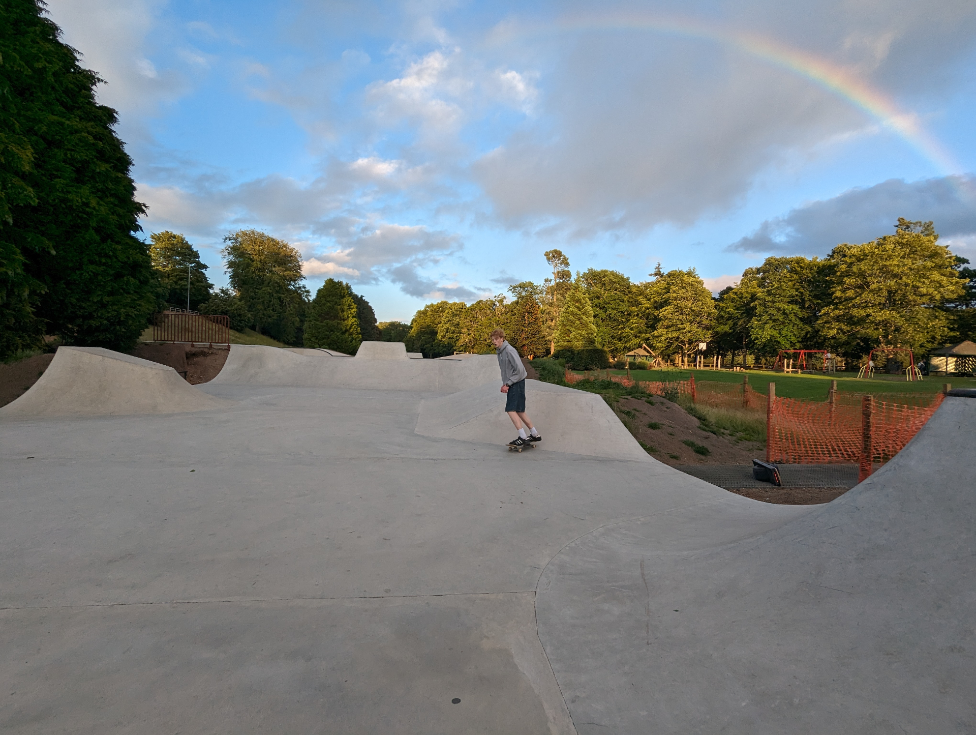 Evening light over Banchory Skatepark in July 2023 with a crew session in full swing