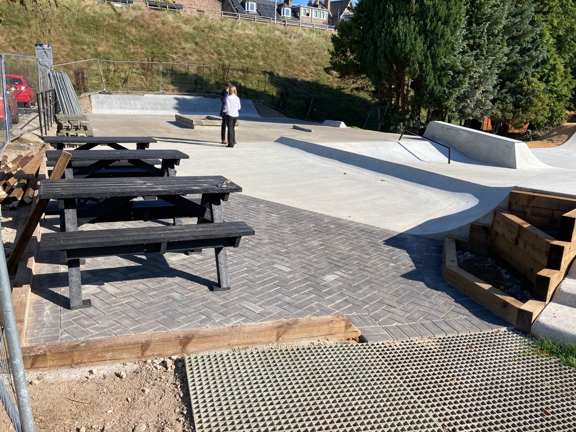 Banchory Skatepark on opening day with picnic benches and finished plaza